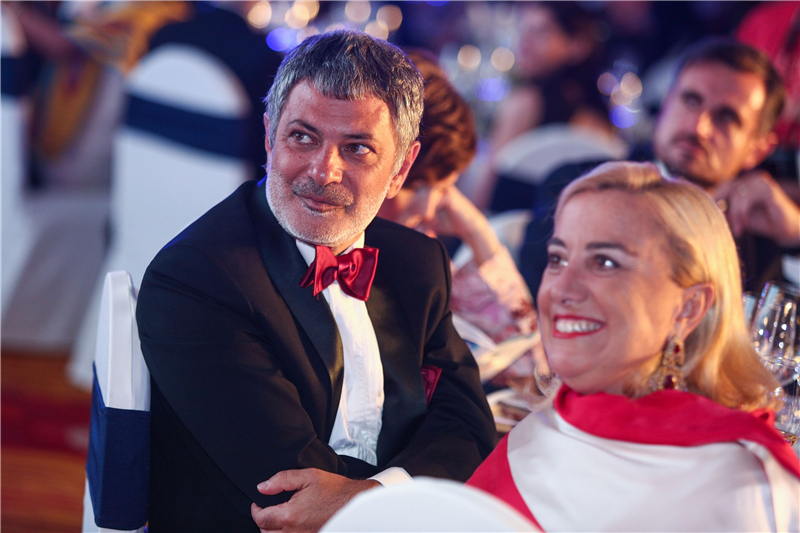 president Davide Cucino with Mrs. Nicoletta Beltrame
